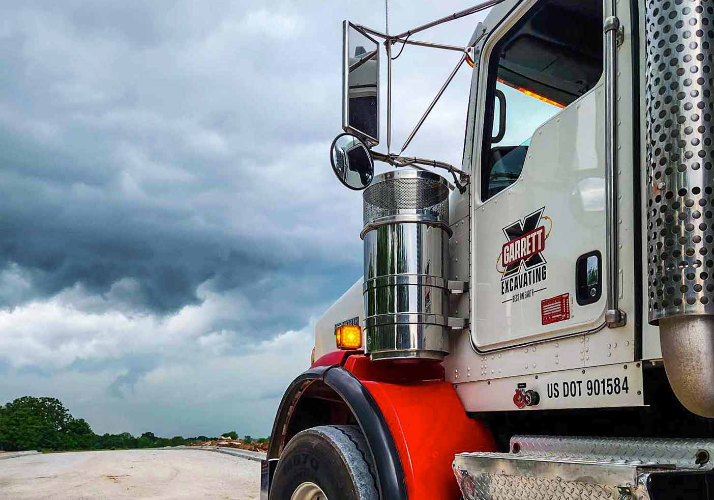 garrett-excavating-large-transport-truck-with-logo